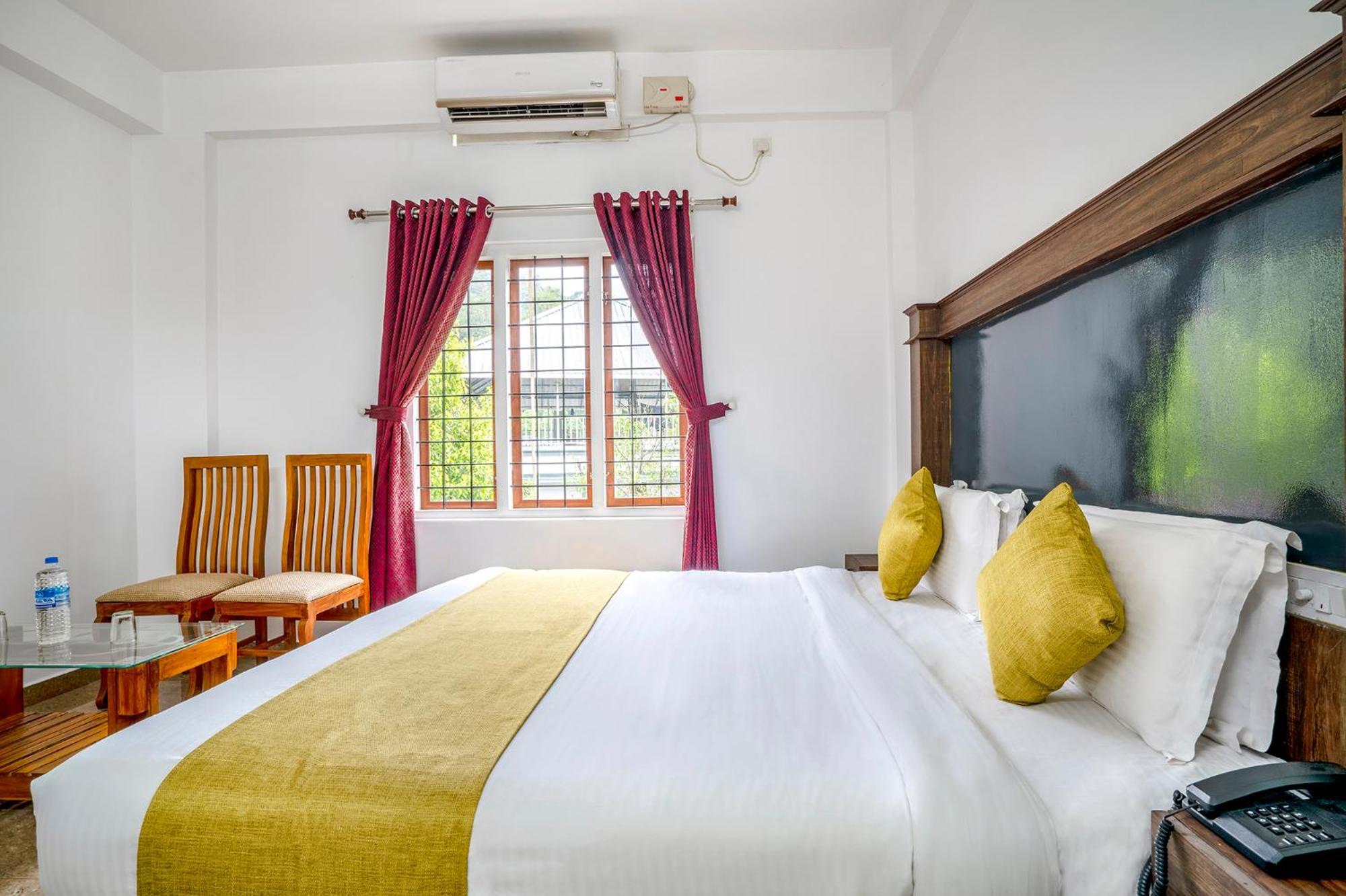 Fabhotel Abrigo Residency Anaviratty ภายนอก รูปภาพ